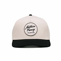 Comus Two Toned Trucker Hat in White and Black
