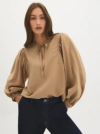 Blouse à manches longues et col noué