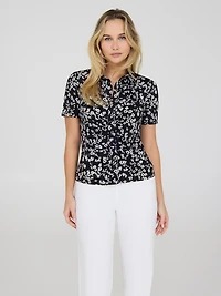 Blouse à imprimé fleuri et boutons sur le devant