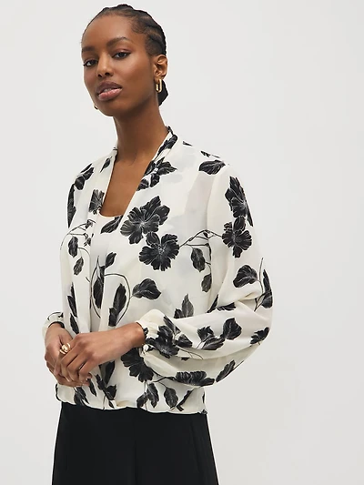Blouse croisée en mousseline à motif floral