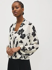 Blouse croisée en mousseline à motif floral