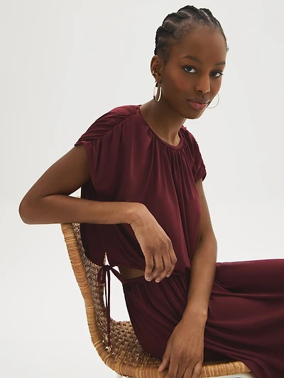 Haut court froncé à nouer sur le côté