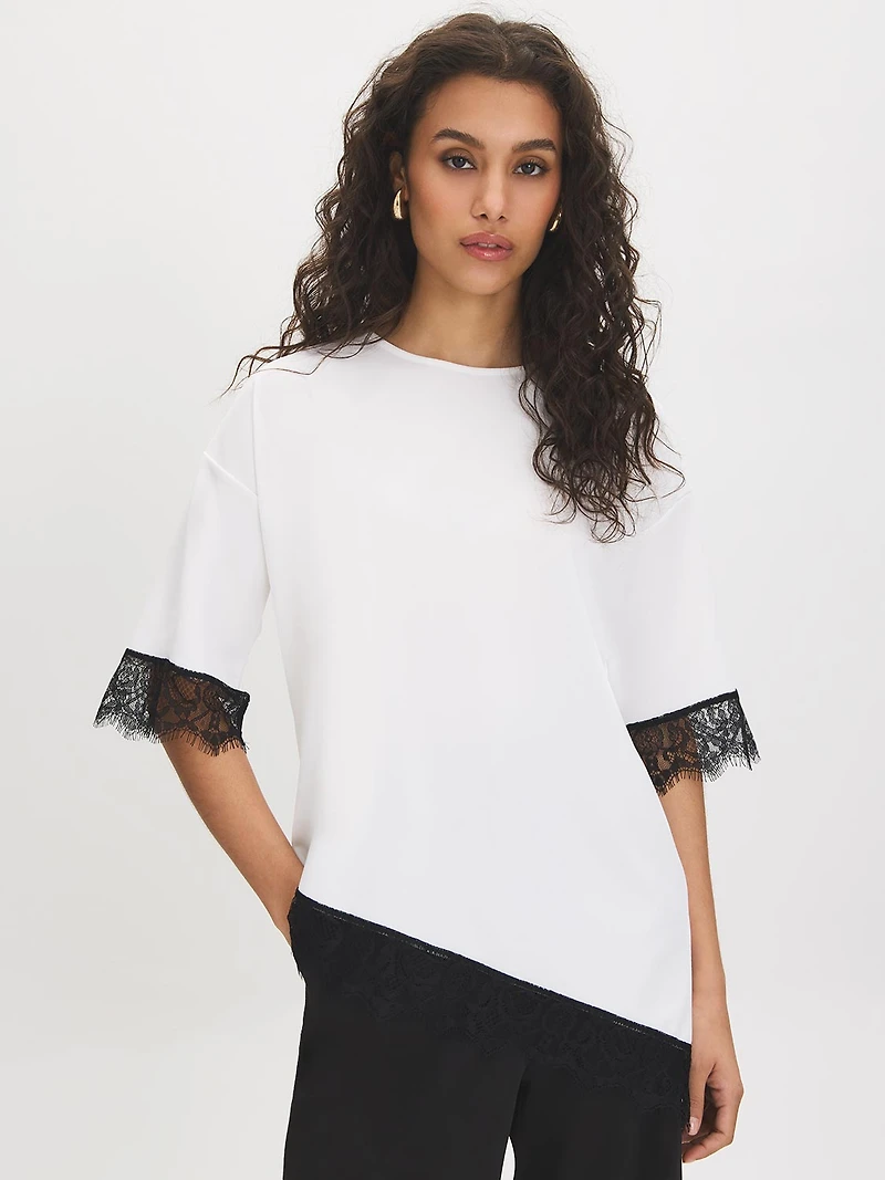 Haut asymétrique avec bordure en dentelle