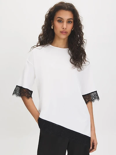 Haut asymétrique avec bordure en dentelle