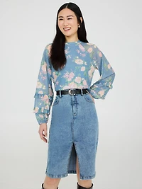 Haut en maille avec détails de volants et imprimé floral