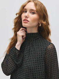 Haut en maille à col montant et imprimé géométrique