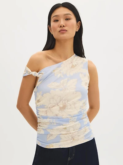 Haut asymétrique en maille à motif floral