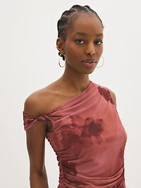 Haut asymétrique en maille à motif florale