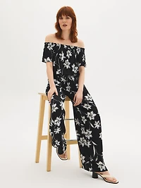 Pantalon à jambe large en gaze froissée et motif floral