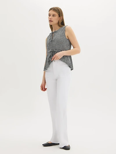 Jean en mélange de coton à bords effilochés