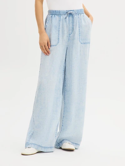 Pantalon en denim délavé à jambe large