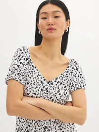 Robe mi-longue imprimée à manches bouffantes