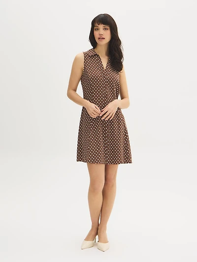 Mini-robe chemise sans manches à pois