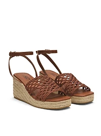 Sandales tressées en faux cuir