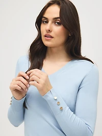 Chandail à col en V et détails boutonnés