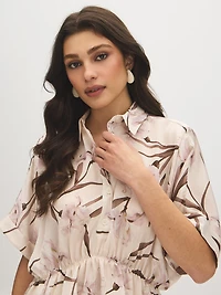 Blouse péplum imprimée à manches dolman