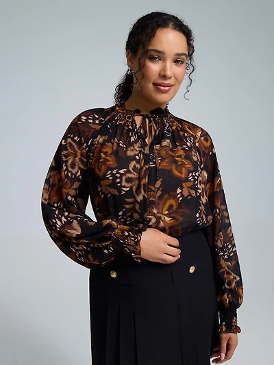 Blouse en mousseline à col smocké et motif floral