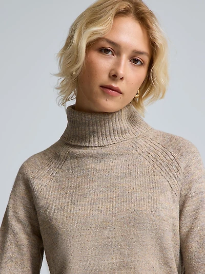 Chandail en maille chinée à col roulé