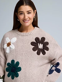 Chandail à motif floral et mailles perlées