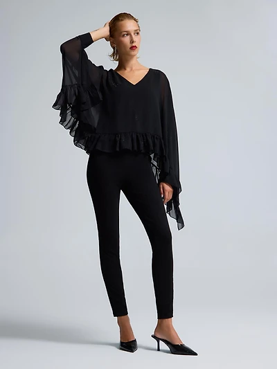 Pantalon à jambe ajustée en velours avec bordure strass