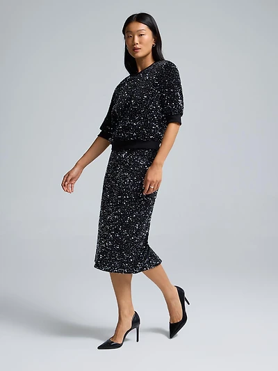 Jupe mi-longue en velours à paillettes