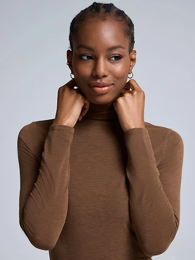 Haut à col roulé semi-transparent