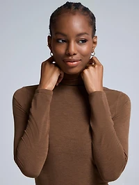 Haut à col roulé semi-transparent