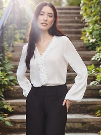 Blouse ajustée avec bordure brodée