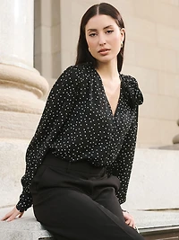 Blouse à pois avec rosette