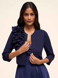 Boléro à manches 3/4 avec volant sur le côté