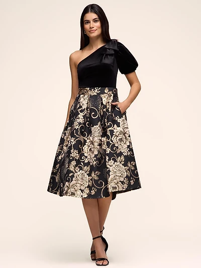 Jupe mi-longue plissée à motif floral en jacquard