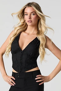 Corset en dentelle fleurie avec agrafes
