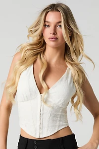 Corset en dentelle fleurie avec agrafes