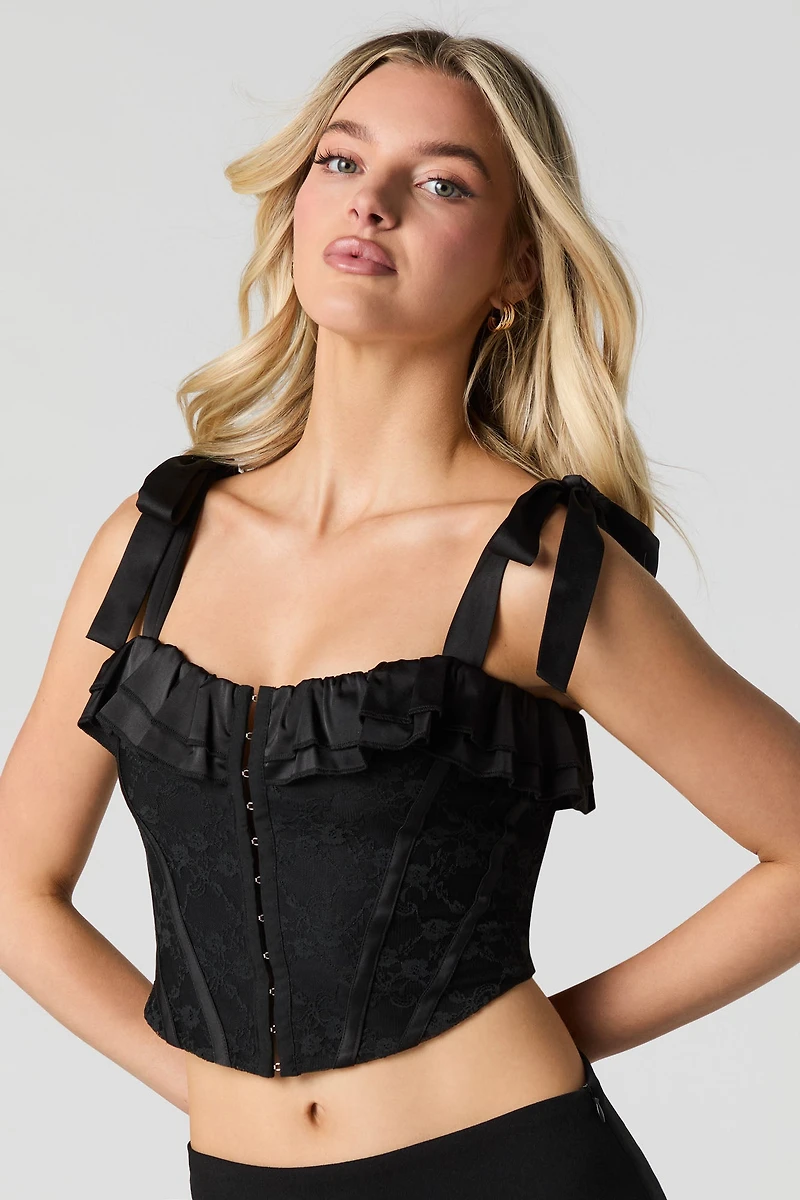 Corset en dentelle fleurie avec bretelles et agrafes