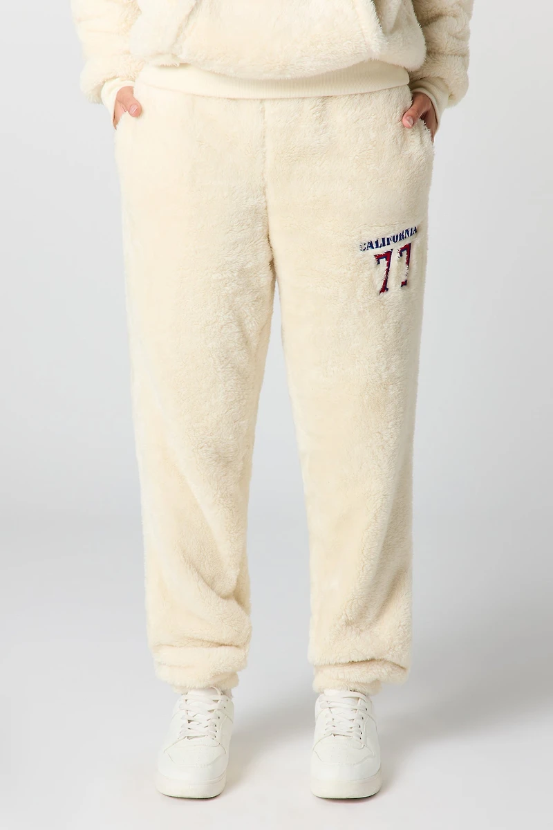 Jogger en similifourrure avec motif brodé