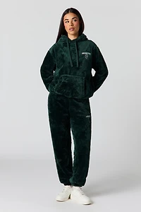 Jogger en similifourrure avec motif brodé