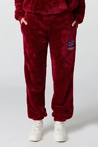 Jogger en similifourrure avec motif brodé