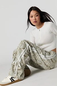 Pantalon large imprimé à nouer sur le côté