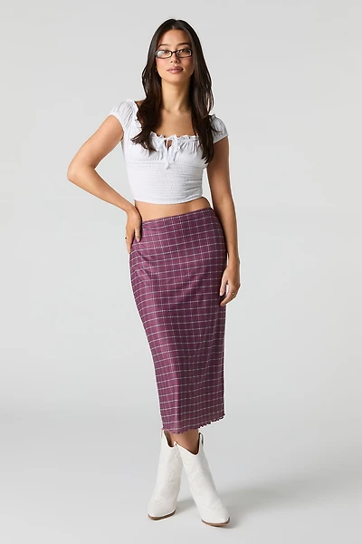 Jupe midi en filet à carreaux