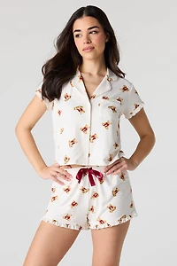 Ensemble pyjama avec haut boutonné imprimé à col et short
