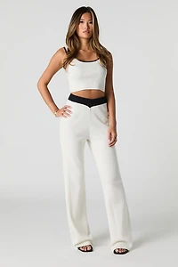 Pantalon en tricot à jambe large et bordure contrastante