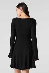 Minirobe trapèze en tricot à manche longue