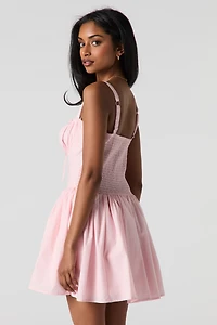 Minirobe corset avec liséré de dentelle