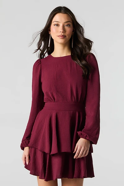 Minirobe fluide étagée à volants et manche longue