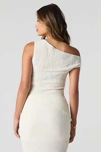 Haut asymétrique texturé à épaule dégagée