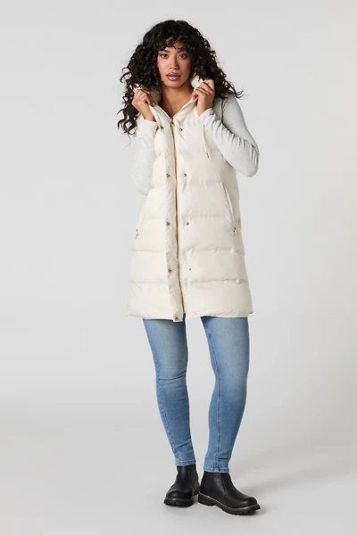 Veste bouffante longue à capuchon