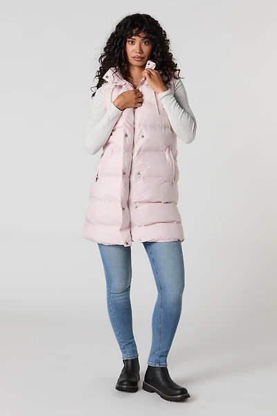 Veste bouffante longue à capuchon