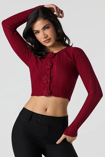 Chandail boutonné en tricot de pointelle avec fleur