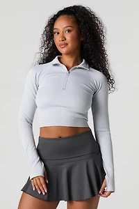 Haut sans couture à glissière un quart et manche longue Active