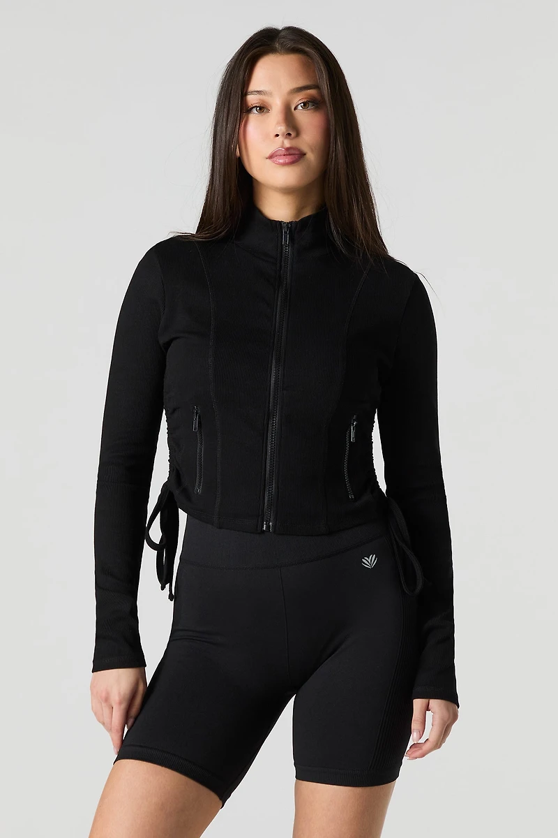 Haut côtelé à glissière et manche longue Active